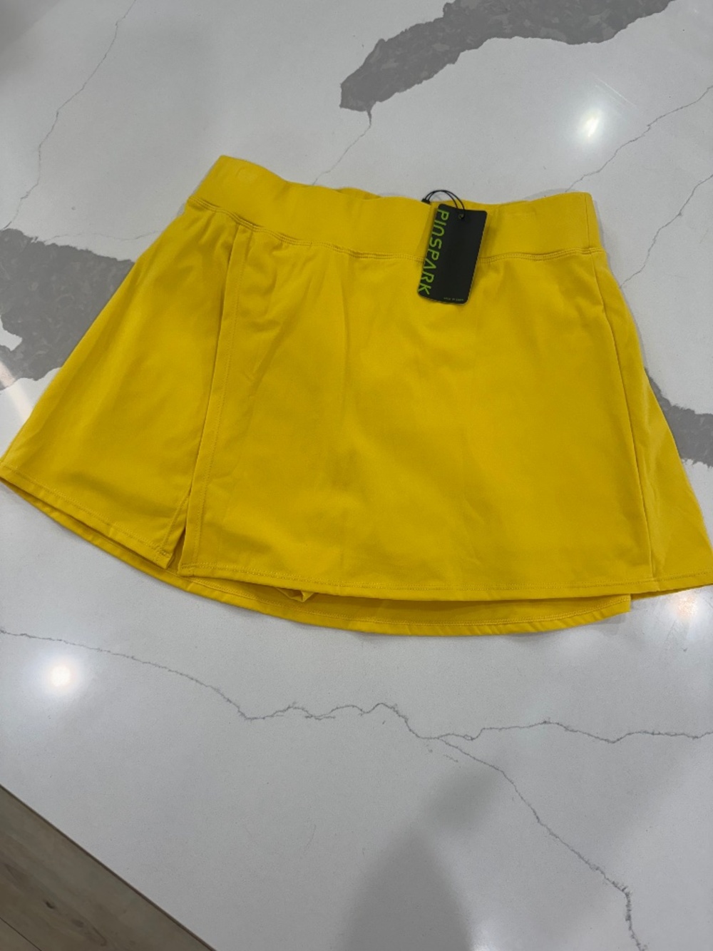 Yellow athletic skirt/built in shorts and pockets- Medium